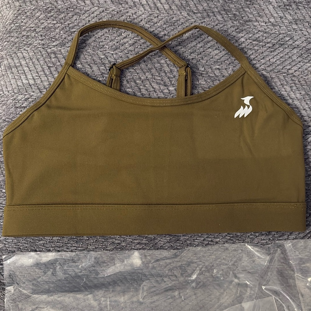 Sport bra. Saina’s brand. Size S. Color gray. New